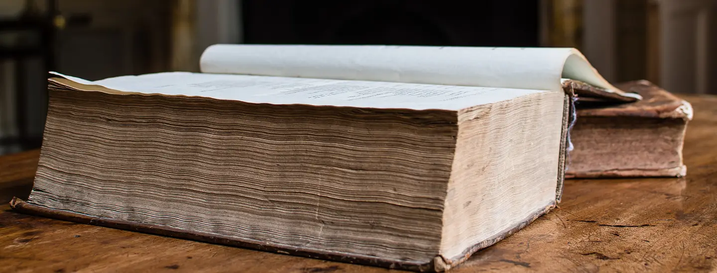 open book on wooden table