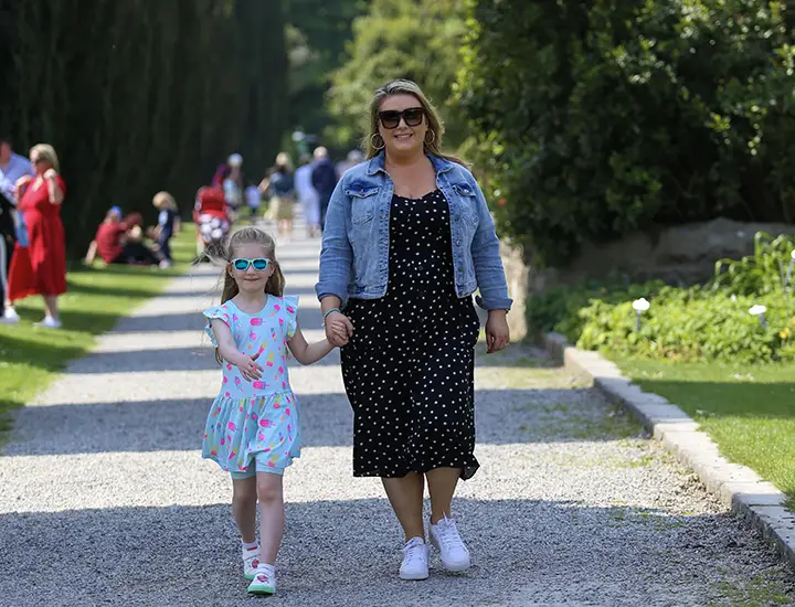 adult and child in the park