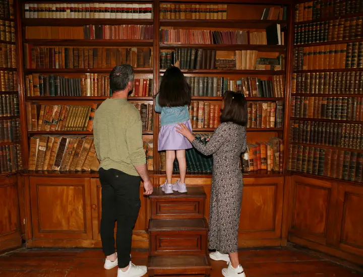 Family in the castle's library