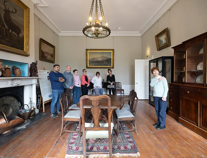 group of visitors during a guided visit inside the castle